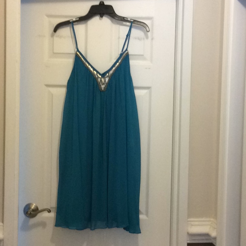 Teal dress never worn.